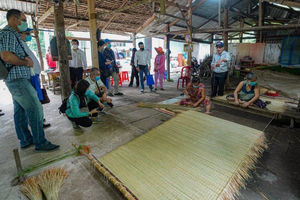 Traditional way of making mats.