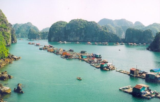 Cua Van Fishing Village is nestled in the middle of Ha Long Bay.