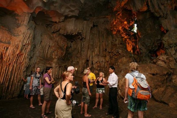 Exploring mysterious caves in Halong Bay