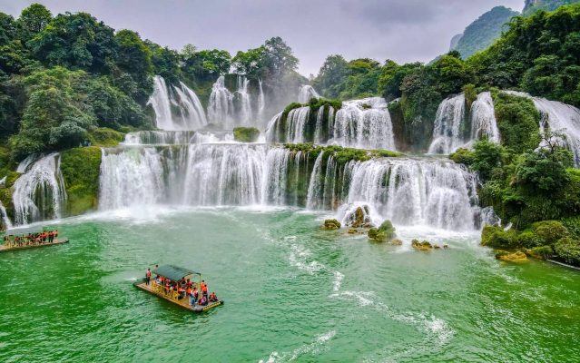 Take a boat trip to see Ban Doc waterfall