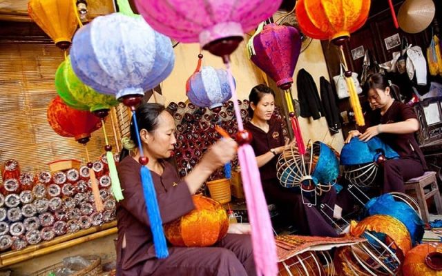 Artisans make lanterns in Hoi An.