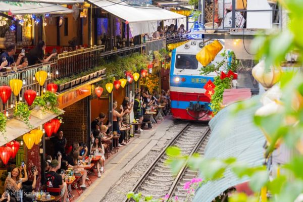 Coffee shops on Hanoi Train Street always attract tourists.