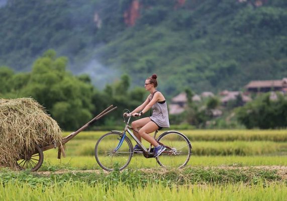 Cycling through the peaceful countryside.