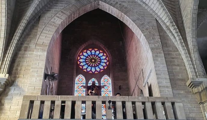 Colorful windows at the stone church.