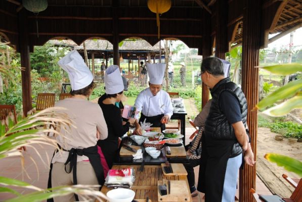 Cooking class takes place right in the vegetable garden.