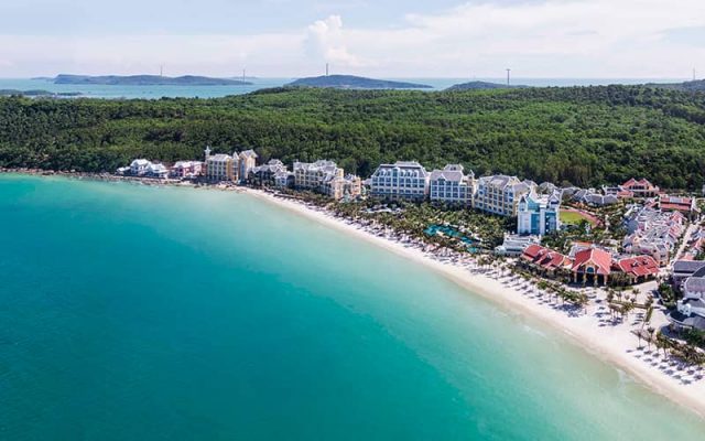 Khem Beach with luxury resorts stretching along the coast.